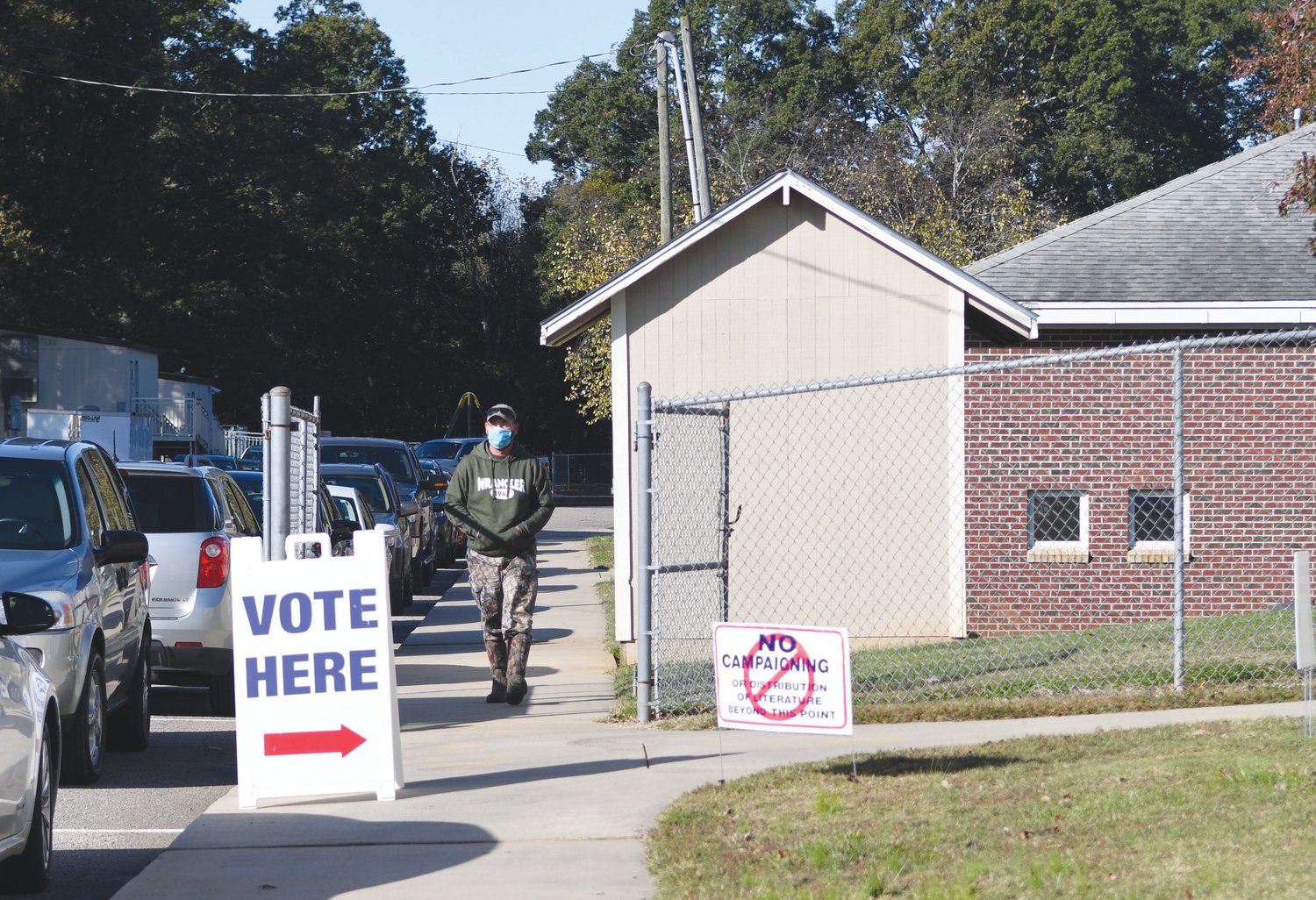 A man walks to cast a vote at the Bonlee School Gym on Election Day Tuesday.